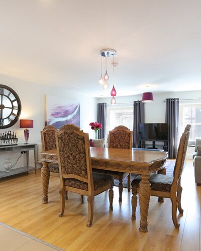 1V7A9413 - Dining table and chairs in open plan Edinburgh apartment.