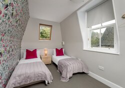 Twin Bedroom in a Corporate Rental Stay