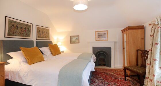 Balgone Coach House - double bedroom - Double bedroom with traditional fireplace at Balgone Coach House, a North Berwick holiday let