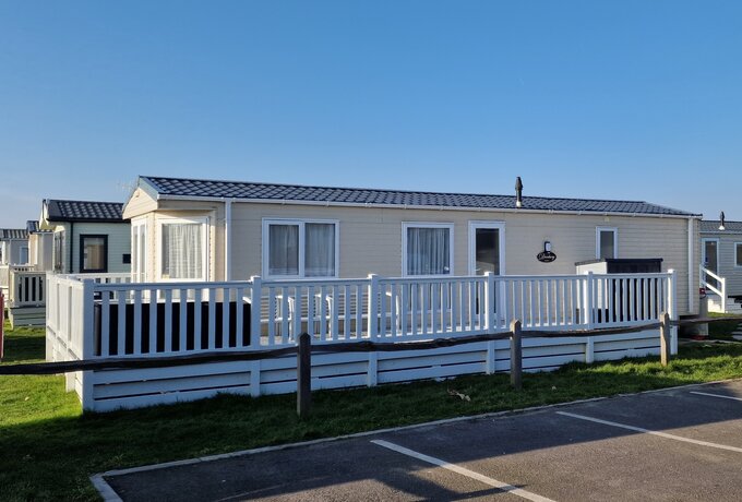 Danbury Holiday Escape Exterior - Exterior and surroundings of Danbury Holiday Escape at West Sands, Selsey, with convenient parking close to the holiday caravan. (© CS Holiday Lets)