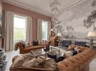 Lounge Area in a Self-Catered Apartment - Stylish living room featuring comfortable sofas and stunning views of Edinburgh Castle