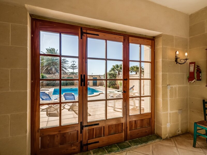 13. Dining area door leading onto pool area