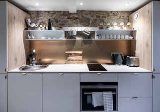 Kitchen in a Private Residential Stay