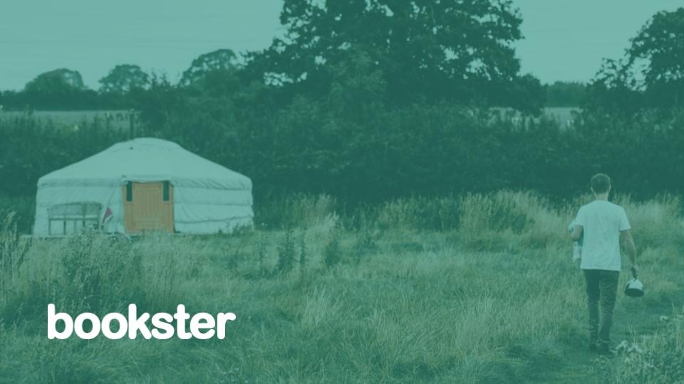 Yurts - Man walking with back to camera towards a yurt. Bookster logo at the bottom. (© Annie Spratt @ Unsplash) Yurts - Man walking with back to camera towards a yurt. Bookster logo at the bottom. (© Annie Spratt @ Unsplash)