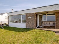 Outside view of The Crest beach bungalow Norfolk