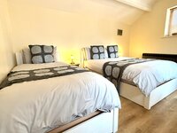 Bedroom with double and single bed
