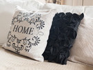 CastleEsplanade-5 - Detail of decorative cushion saying "home" on corner sofa
