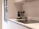 Stafford Street Apartment Kitchen Diner - Nespresso machine and capsules in bright kitchen
