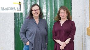 Ben and Joy - A photo of two ladies, Ben on the left and Joy on the right, in front of a green door.