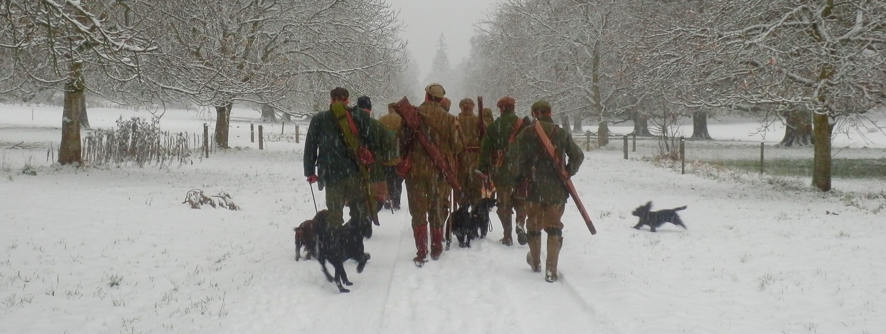 Shooting party on Murthly Estate - A pheasant shooting party heads off to the next drive in the wintry snow (© Murthly Estate)