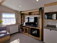 Lounge with TV and Fireplace