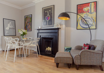 Dining Area - Another luxurious fireplace and fantastic artwork (© The Edinburgh Address)
