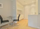 Simpson Loan (New) 5 - Modern kitchen with gleaming white countertops in Edinburgh holiday let