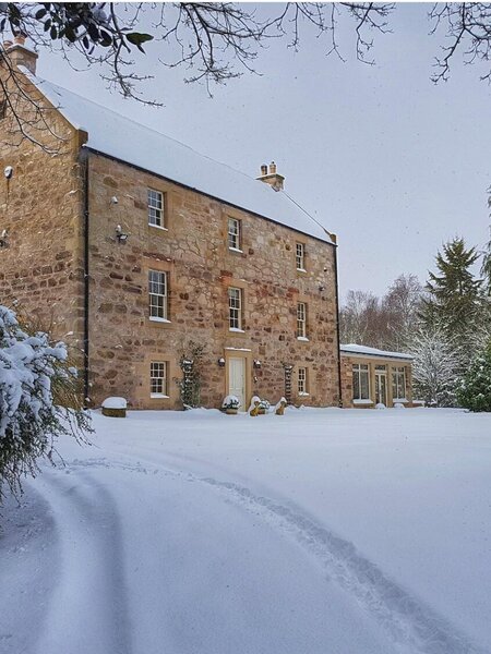 The Old Millhouse in the snow