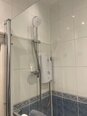 Shower in the main bathroom of self-catering flat in Edinburgh