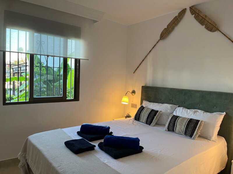 Cozy Bedroom with Tropical Decor