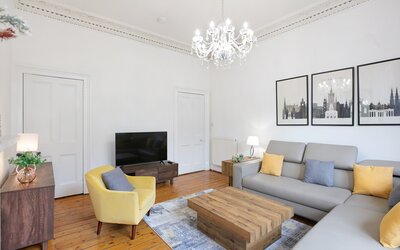 The Forrest Road Residence - living room - Living room with flat screen TV and comfortable seating