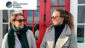 Case Study: The Pembrokeshire Holiday Company owners - Photo of two ladies looking at each other and smiling.