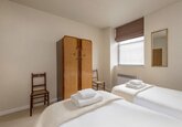 Bedroom in a City Break Apartment