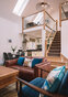 Sitting room, stair case and mezzanine