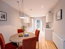 Stafford Street Apartment Kitchen Diner - Bright kitchen diner with table and four chairs
