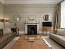 Modern Lounge in a Private Residential Tenancy - Chic, state-of-the-art living room with stylish earthy décor, blending modern luxury with natural warmth