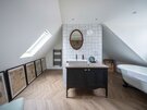 Well-lit Bathroom in Self-Catered Cottage - Elegant bathroom featuring premium products and thoughtfully designed details, creating a relaxing atmosphere