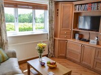 Living room in our Norfolk holiday home with countryside views