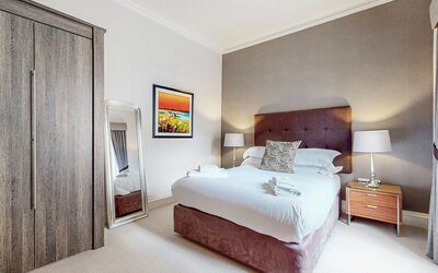 19-web-or-mls-242 West George Street Lomond_19 - Inviting bedroom with plush bedding for a restful night’s sleep