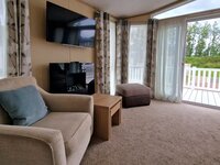 Lounge with TV and Fireplace