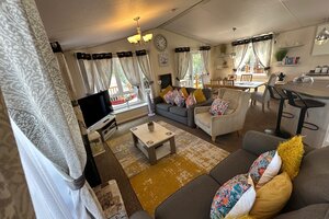 open plan living area - open plan living area with sofa bed, kitchen with dishwasher, fridge freezer, breakfast bar, tv, fireplace