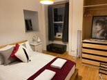 Double bedroom 2 with window in Edinburgh flat