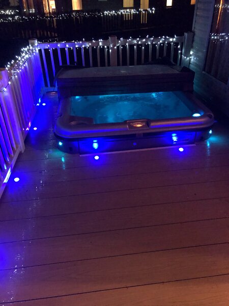 Hot tub lit up on an evening
