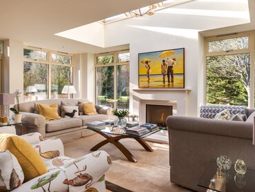 Bright Orangery in a Holiday Let in Scotland - The Orangery - featuring comfortable sofas, an elegant table and stunning views