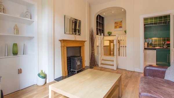 BroughtonRoad_001 - Family living room with raised dining area and coal effect fire