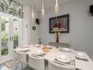 Dining Area in Luxury House to Rent Scotland - Spacious dining space featuring a well-lit, contemporary design. Ideal for family-friendly meals and business travellers.