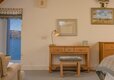 Bright Bedroom in a Rural Cottage