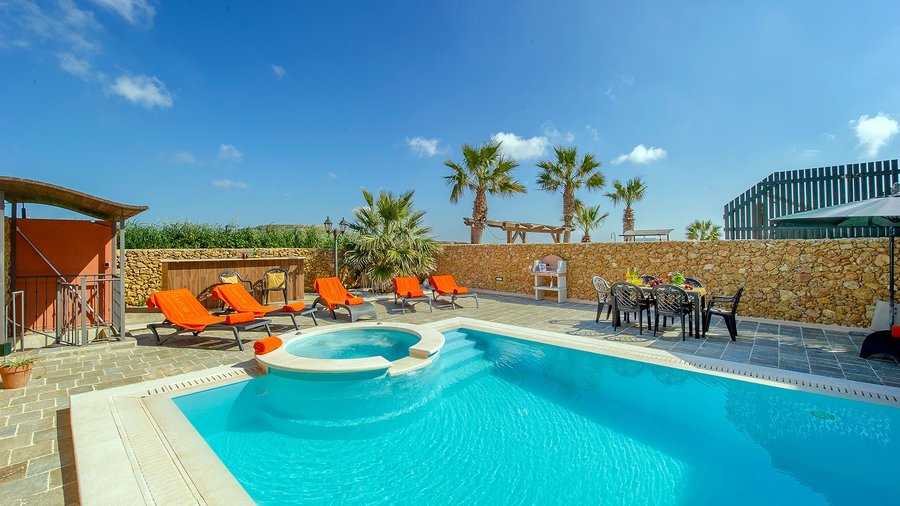 Erika's Jacuzzi Pool - Many of Gozo's holiday farmhouses have a private outdoor pool.  Erika has another key feature. It is surrounded by lovely countryside views of Gozo.