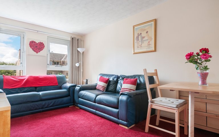 Polwarth-Terrace-05 - Lounge with blue leather sofas and red carpet Polwarth-Terrace-05 - Lounge with blue leather sofas and red carpet