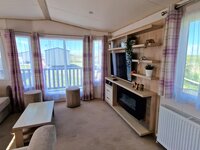Lounge with TV and Fireplace