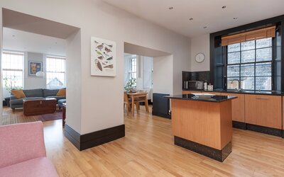 Open kitchen area with living room next to it