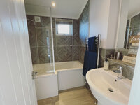 Main bathroom with corner bath