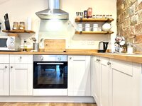 Fully stocked kitchenette.