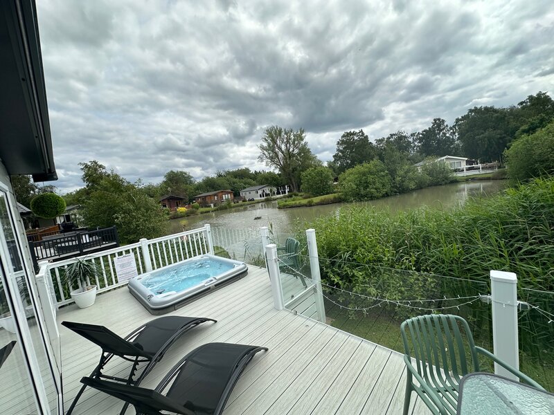 lakeside view with hot tub