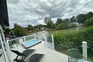 lakeside view with hot tub