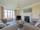 Lounge St Aidans - Cosy living room with fireplace in North Berwick.