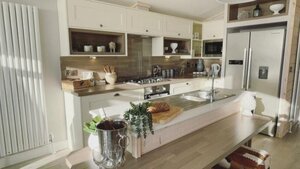 CS Holiday Lets Kitchen - A bright and spacious white kitchen.