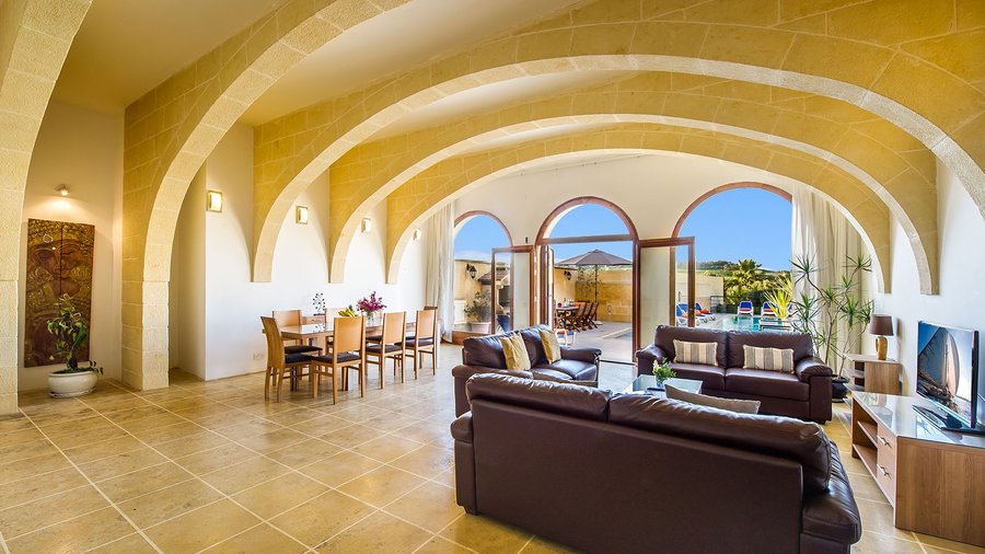 Four Winds farmhouse - A lounge of local limestone ceiling arches, adding character and charm to this newly finished farmhouse.