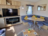 Lounge, TV and Fireplace and Dining Area