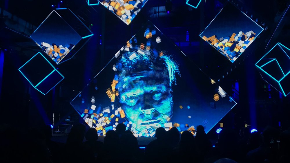 Robot presenter at Click 2018 - Presenter on screens at event. Robot presenter at Click 2018 - Presenter on screens at event.